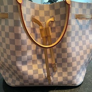 Authentic Girolata Damien Azur Louis Vuitton bag.